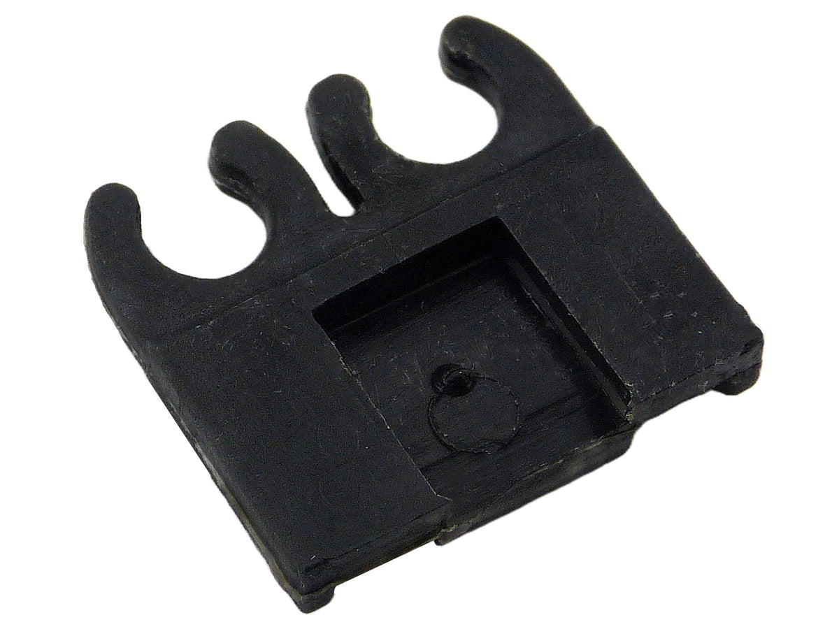 A small black plastic clip or fastener with three prongs and a rectangular slot, shown on a plain white background.