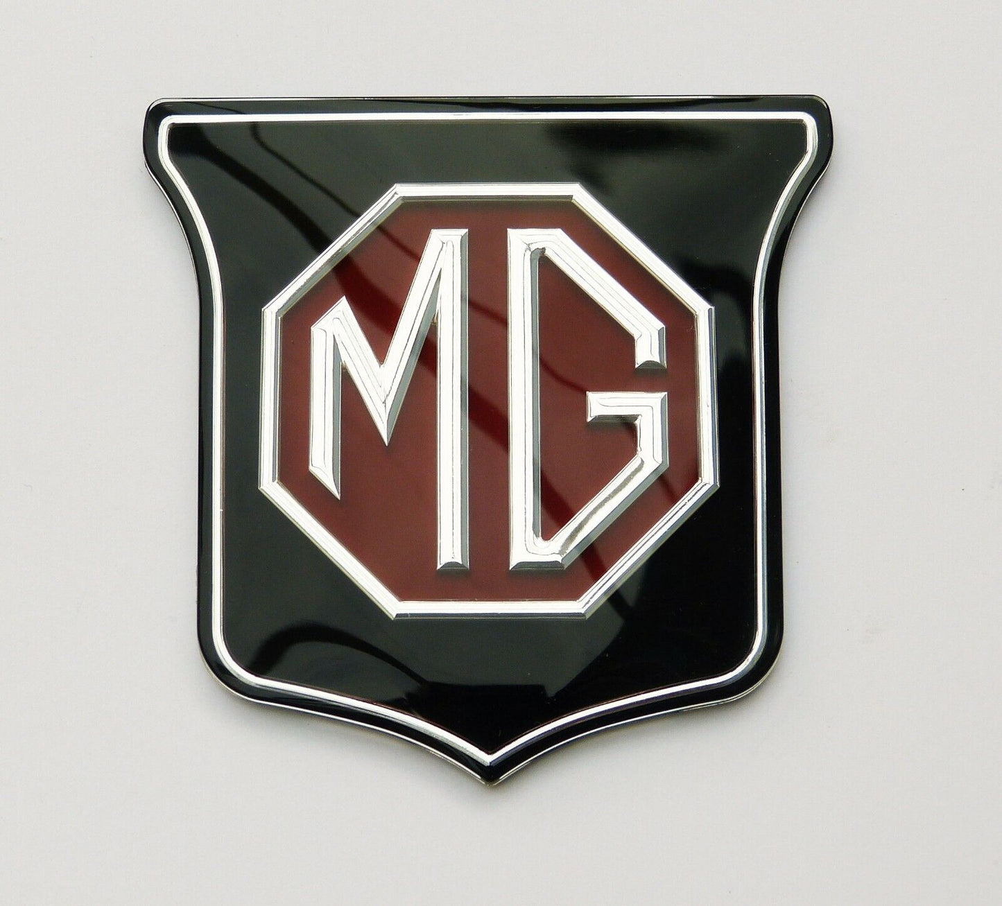 MGB & MGBGT / MGB GT Midget Red & Black Front Grill Badge, MG part ARA2148