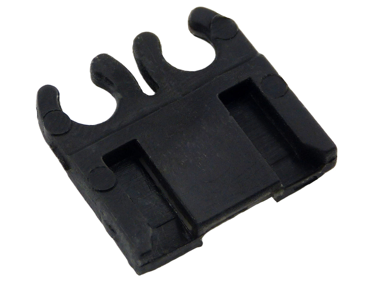 A small black plastic multi-prong connector or clip with three upward-pointing prongs and a rectangular slot on the base, shown on a plain white background.