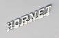 Austin Mini / Wolseley Hornet Chrome Metal Badge, BMC part ALA5013