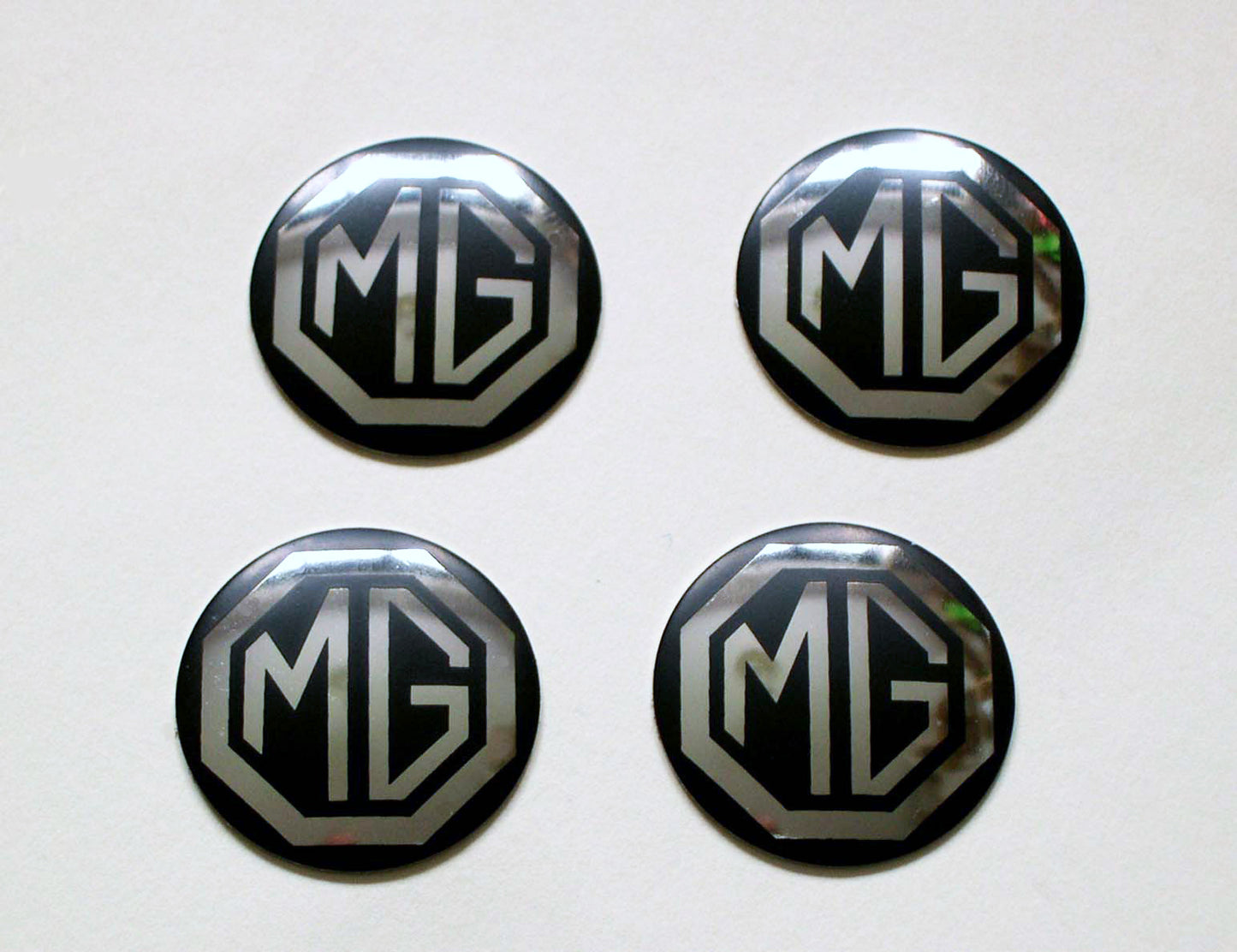 MG Midget Rostyle Wheel Centre Adhesive Badges set of 4, MG part AHA8950B