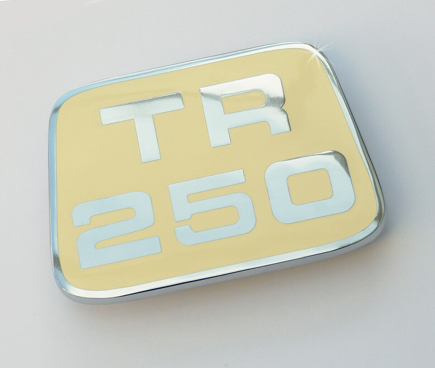 Triumph TR250 (TR5) Cream Enamel & Chrome Bonnet Badge / Medallion, 622278